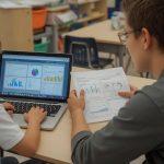child-completing-digital-assessments-in-online-primary-education