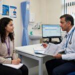 university student having a confidential consultation with a qualified doctor